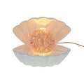 Lampe coquillage nacrée à paillettes multicolores - image 1